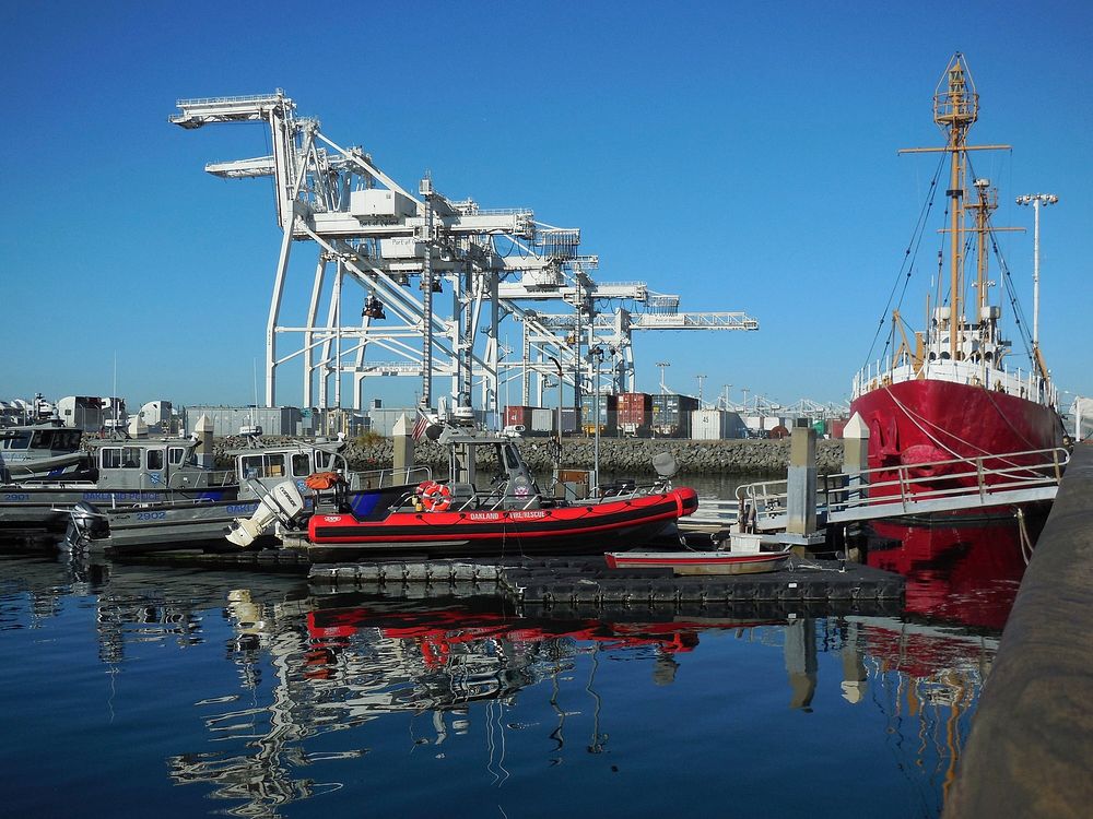 Oakland Harbor With Giant Cranes Or Jack Hammers