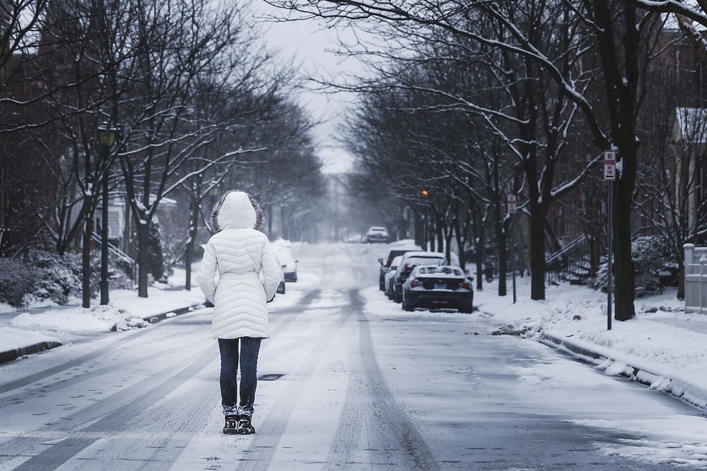 Free woman standing on street in winter image, public domain people CC0 photo.
