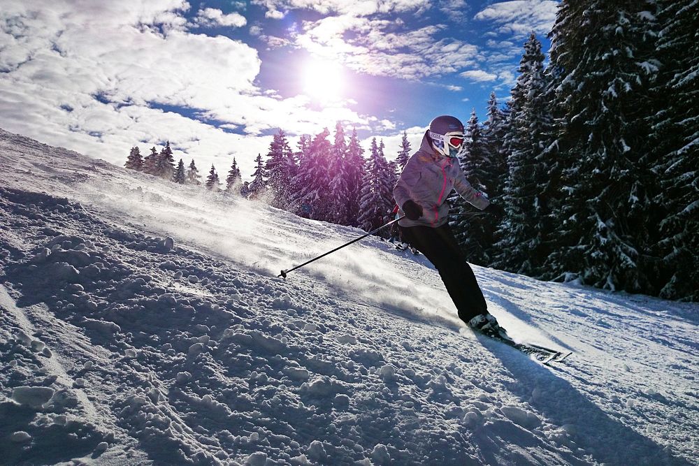Free person skiing down a mountain photo, public domain sport CC0 image.