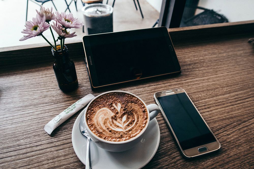 Free coffee with electronic devices on wooden table public domain CC0 photo.