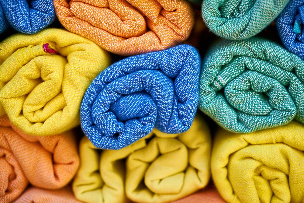 Free colourful blanket rolls image, public domain fabric CC0 photo.