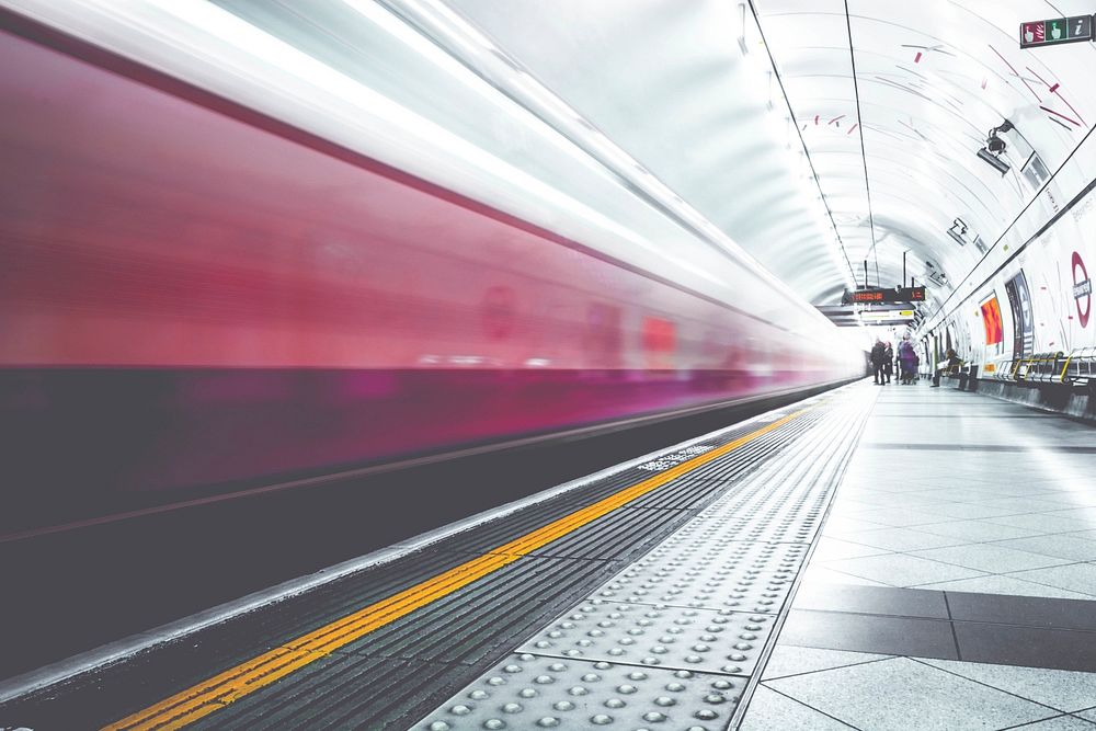 Free train station in motion image, public domain CC0 photo.