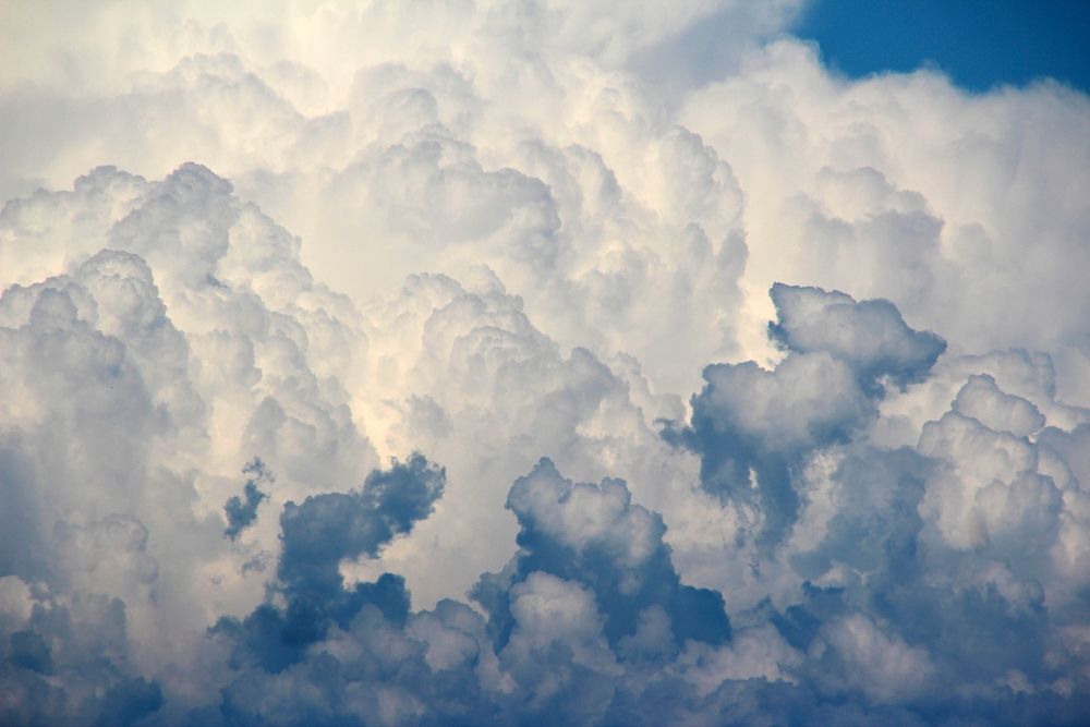 Cloudy blue sky background , free public domain CC0 photo.