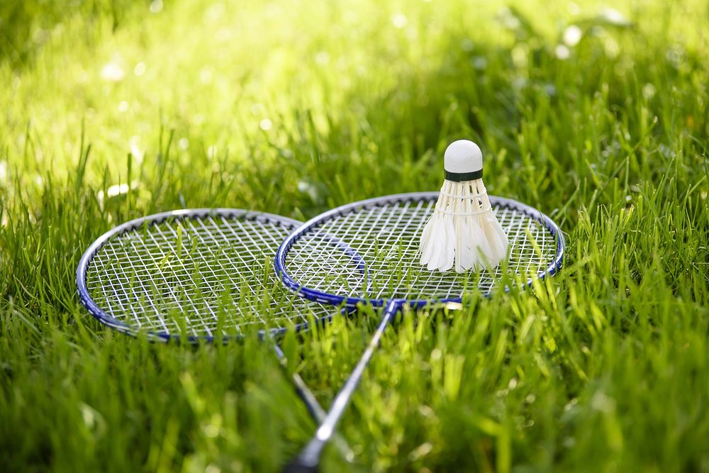 Free badminton racket and shuttlecock image, public domain sports CC0 photo.