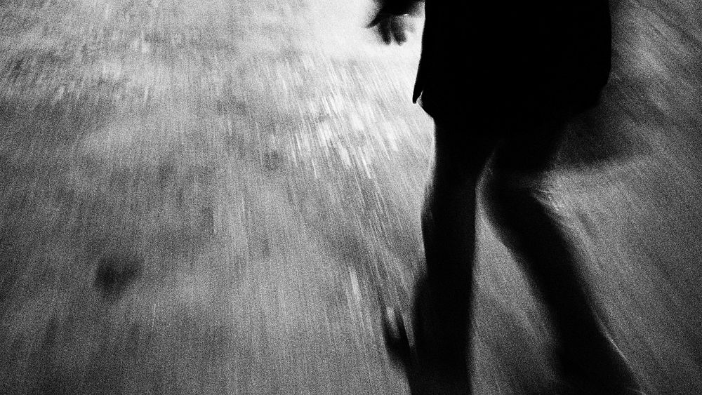 Free man walking in the dark image, public domain grey background CC0 photo.
