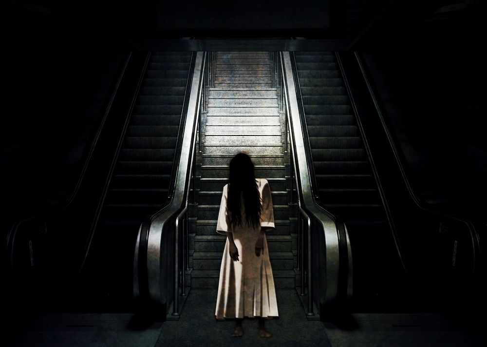 Free female ghost on escalator image, public domain CC0 photo.