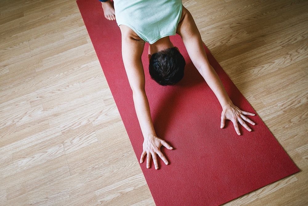 Free woman doing yoga pose photo, public domain sport CC0 image.