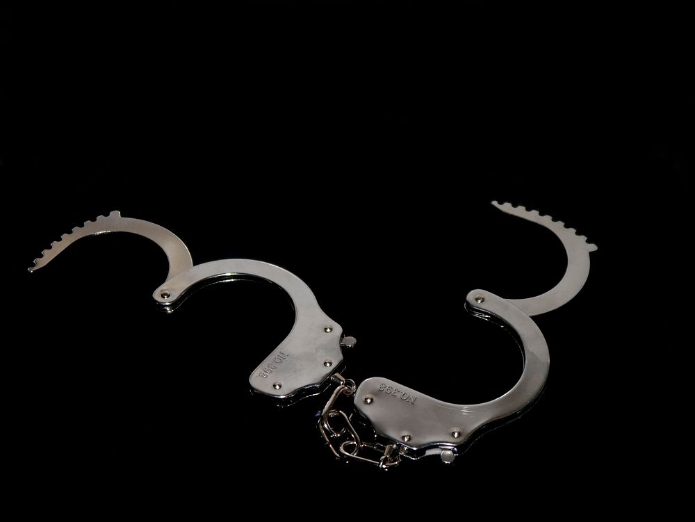 Free handcuffs image, public domain crime CC0 photo.