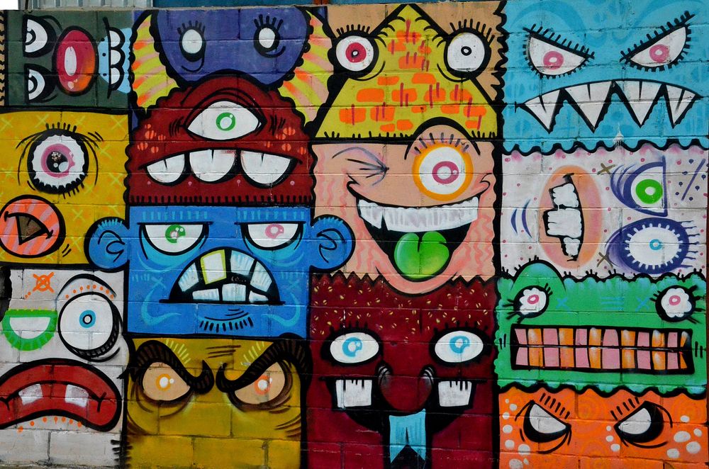 Colorful monster face graffiti art in New York, USA - 02/12/2017