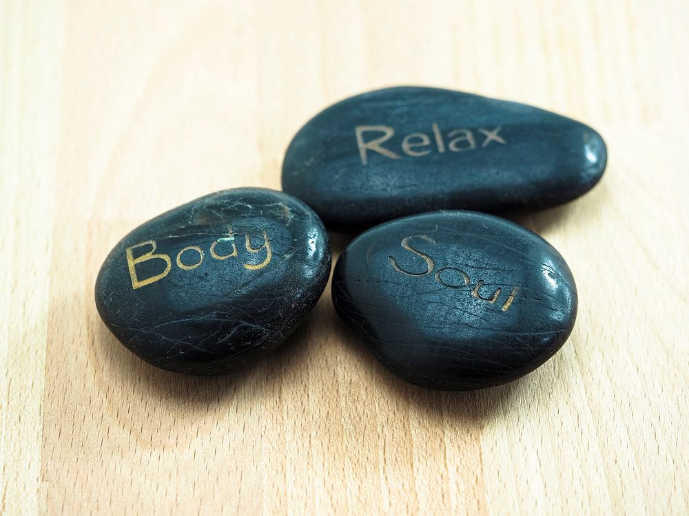 Free calming words engraved on stones image, public domain mindfulness CC0 photo.