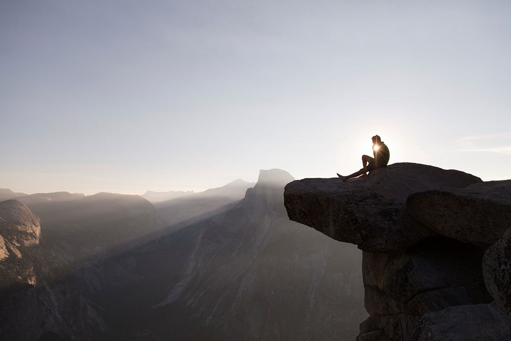 Free person on mountain cliff photo, public domain nature CC0 image.