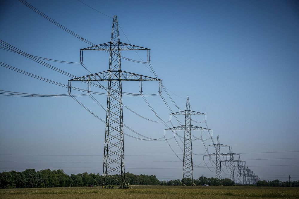 Power lines through nature, free public domain CC0 image.