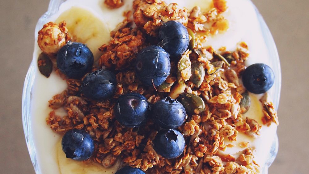 Free granola and fruit bowl closeup photo, public domain CC0 image.