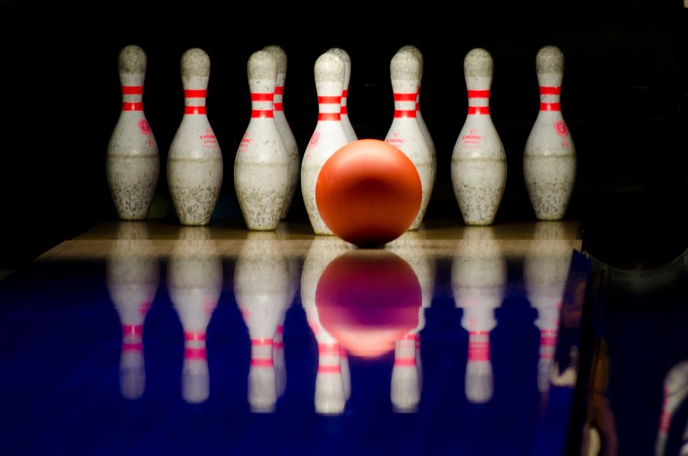 Free bowling pins with ball lined up image, public domain sport CC0 photo.