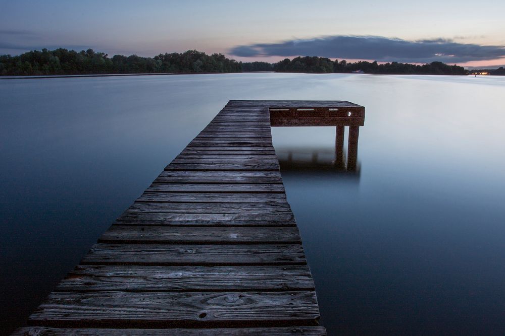 Wooden jetty at lake, free public domain CC0 image.