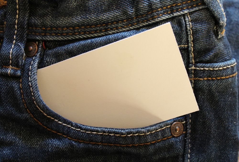 Free white paper in jean pocket image, public domain cloth CC0 photo.