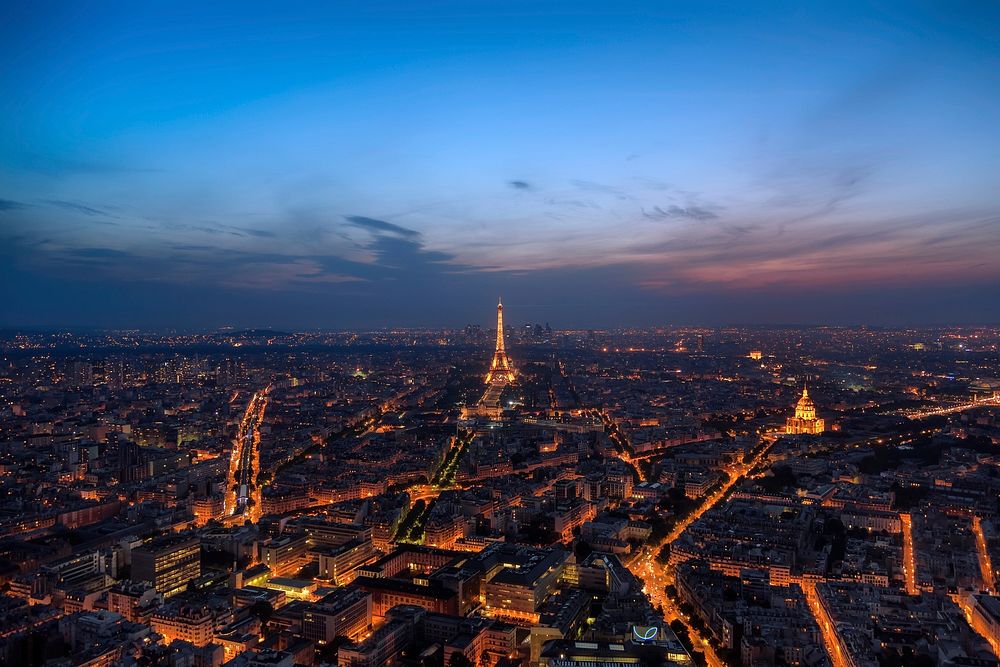 Free Eiffel Tower and Paris cityscape at night photo, public domain building CC0 photo.