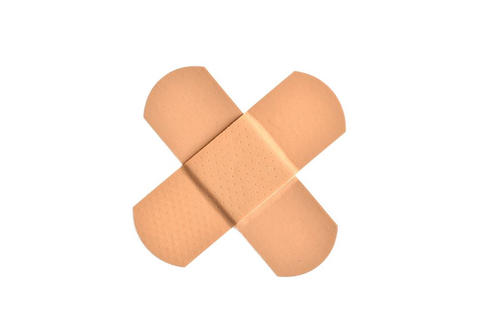 Free x shape bandage image, public domain CC0 photo.