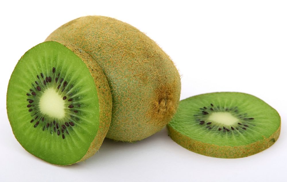 Free kiwi, slices, white background photo, public domain fruit CC0 image.