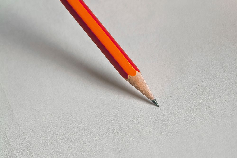 Free pencil on blank paper image, public domain CC0 photo.