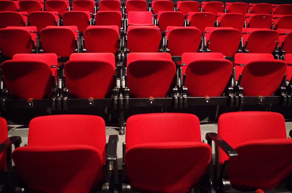 Rows of cinema seats, free public domain CC0 image.