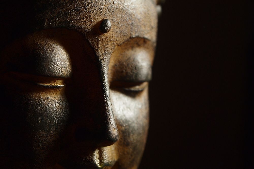 Free close up face of Buddha sculpture image, public domain CC0 photo.