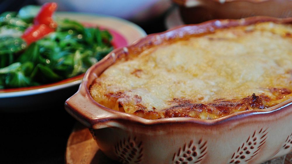 Free baked lasagna in bowl image, public domain food CC0 photo.