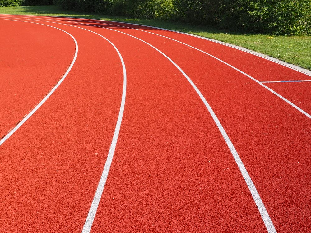 Free close up texture of running track surface photo, public domain sport CC0 image.