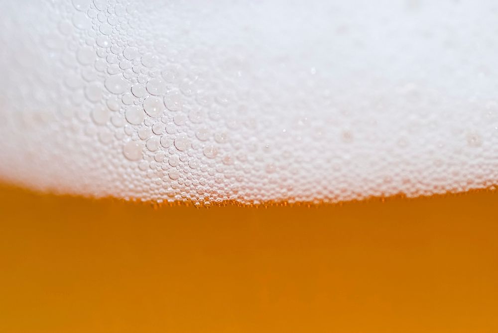 Free beer foam closeup image, public domain alcohol drink CC0 photo.