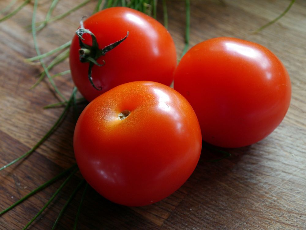 Free closeup image on three fresh tomatoes, public domain CC0 photo.