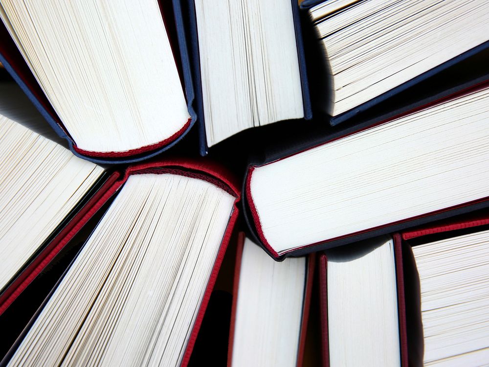 Free pile of books image, public domain CC0 photo.