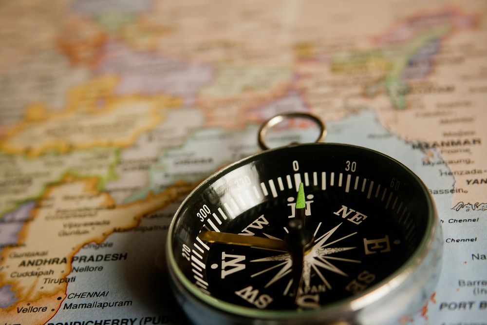 Free compass and map image, public domain travel CC0 photo.