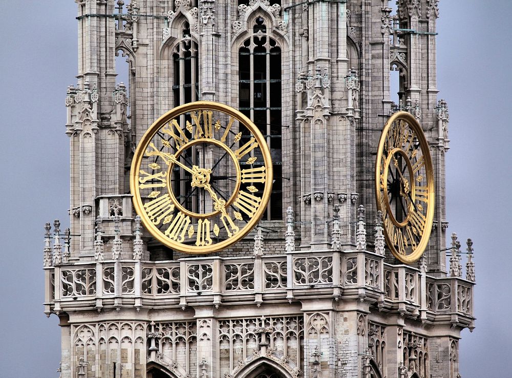 Free Golden clock at Cathedral of Our Lady in Antwerp, Belgium image, public domain CC0 photo.