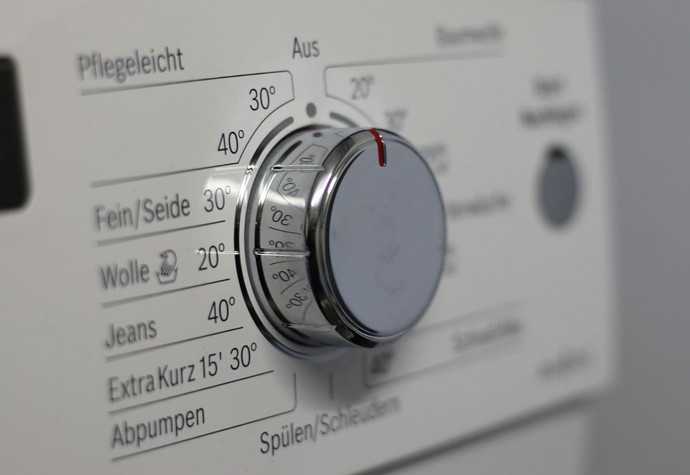 Laundy machine knob, free public domain CC0 image.