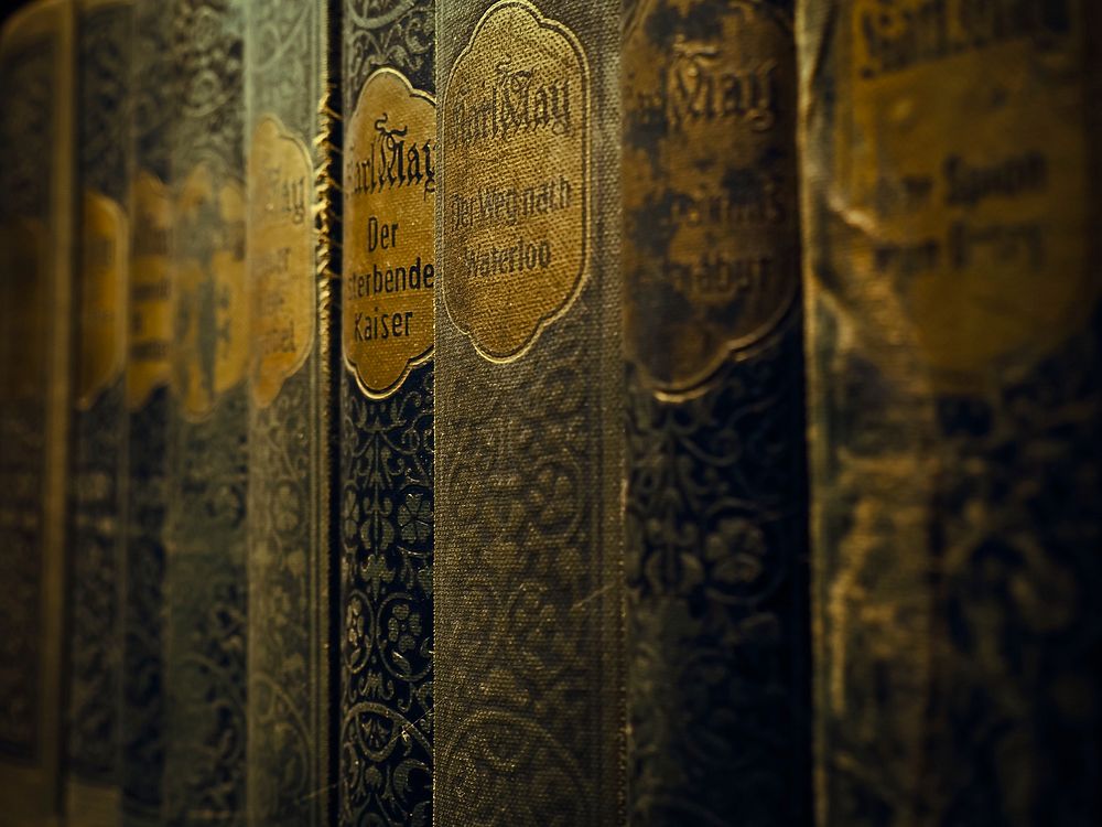 Free old ancient books in shelf photo, public domain CC0 image.