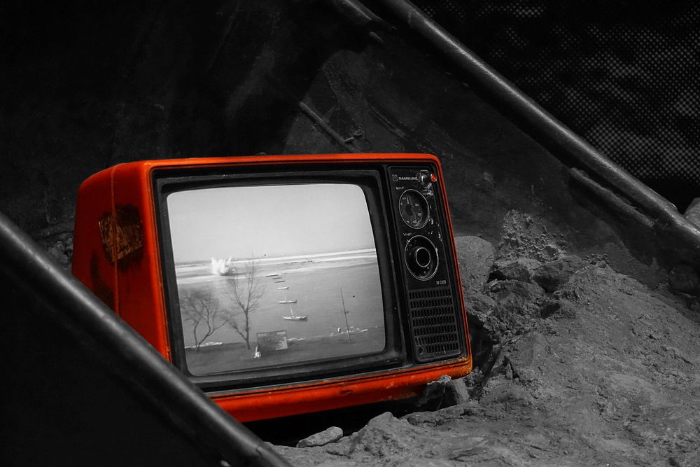 Retro red television box in black and white photo, free public domain CC0 photo.