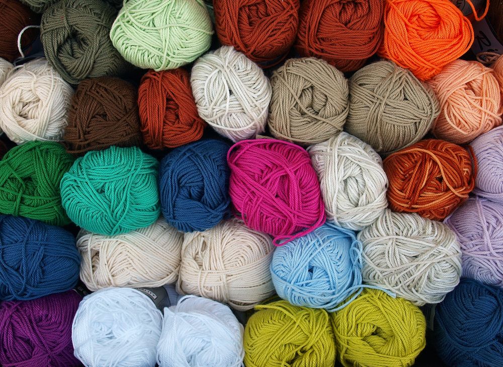 Free stacked yarn image, public domain yarn CC0 photo.