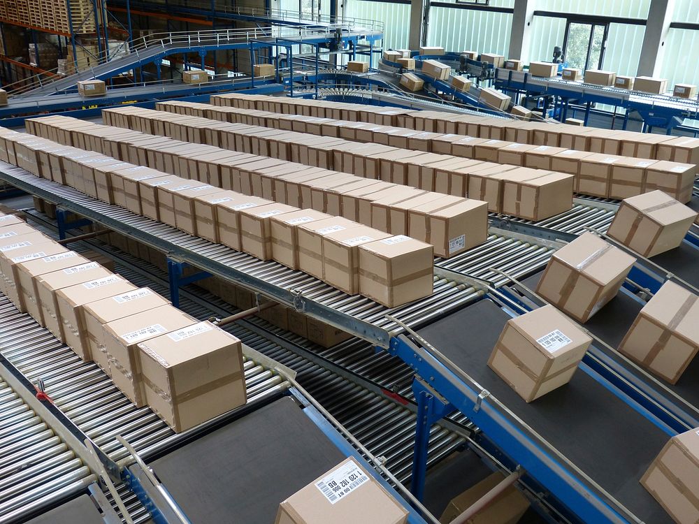 Free carton boxes in factory photo, public domain warehouse CC0 image.