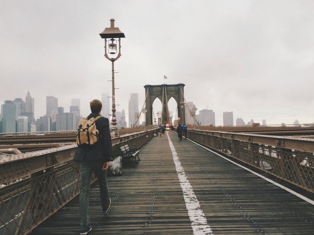 Free man standing on Brooklyn Bridge image, public domain CC0 photo.