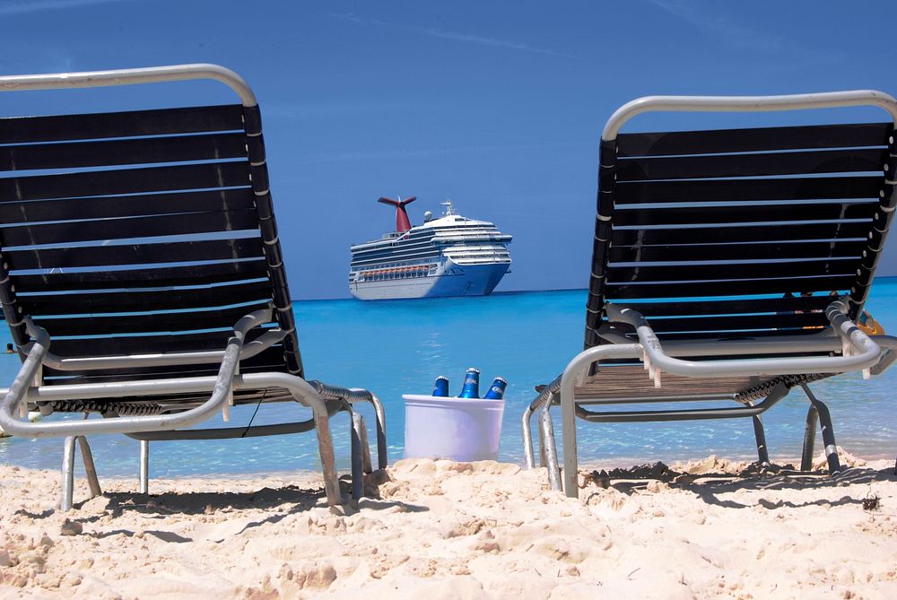 Free two beach chairs on the beach with drinks and a cruise view image, public domain CC0 photo.