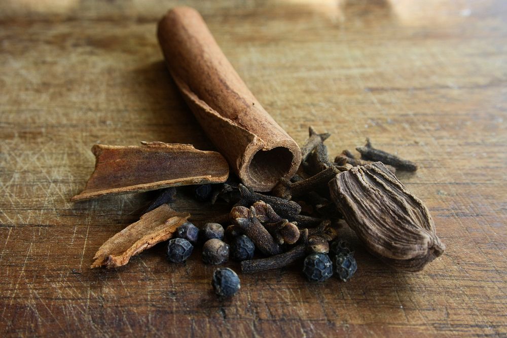 Free cinnamon, cardamon, and peppercorn image, public domain food CC0 photo.