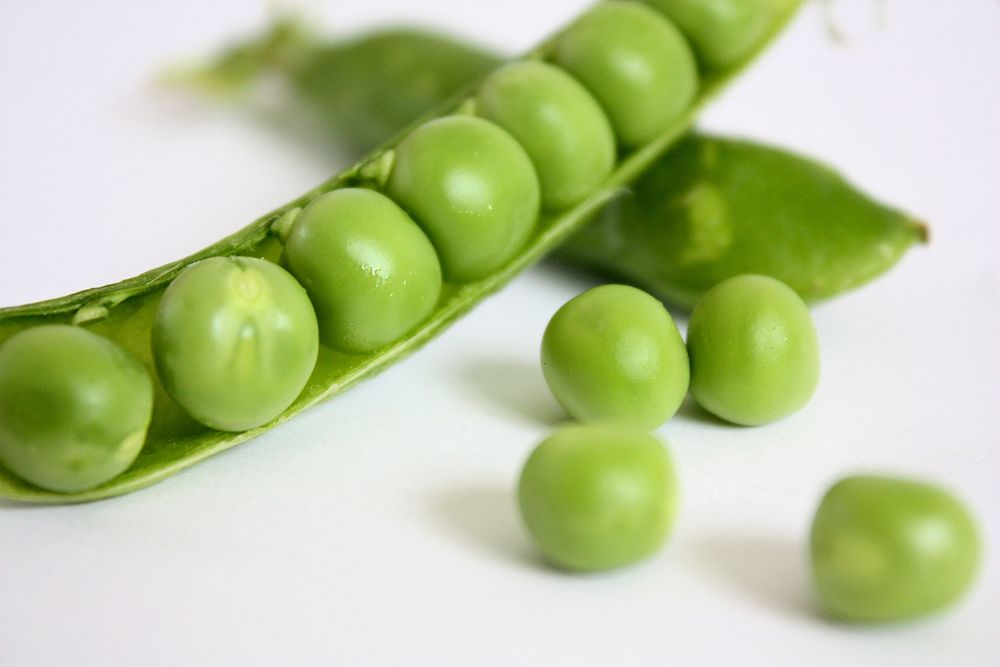 Free image of green peas in pod, public domain CC0 photo.