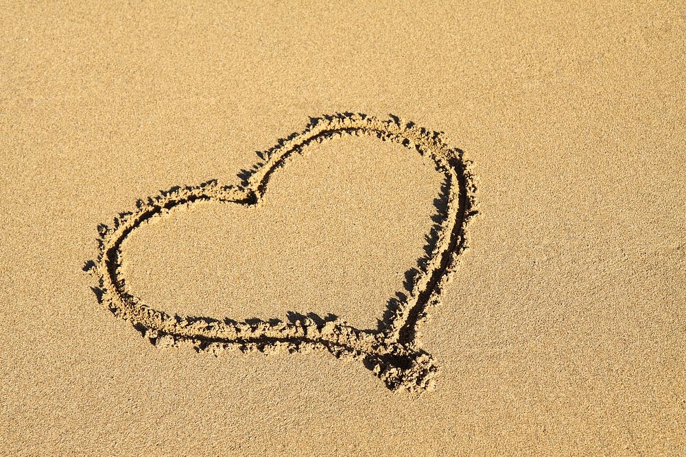Free heart drawn on sand at beach image, public domain CC0 photo.