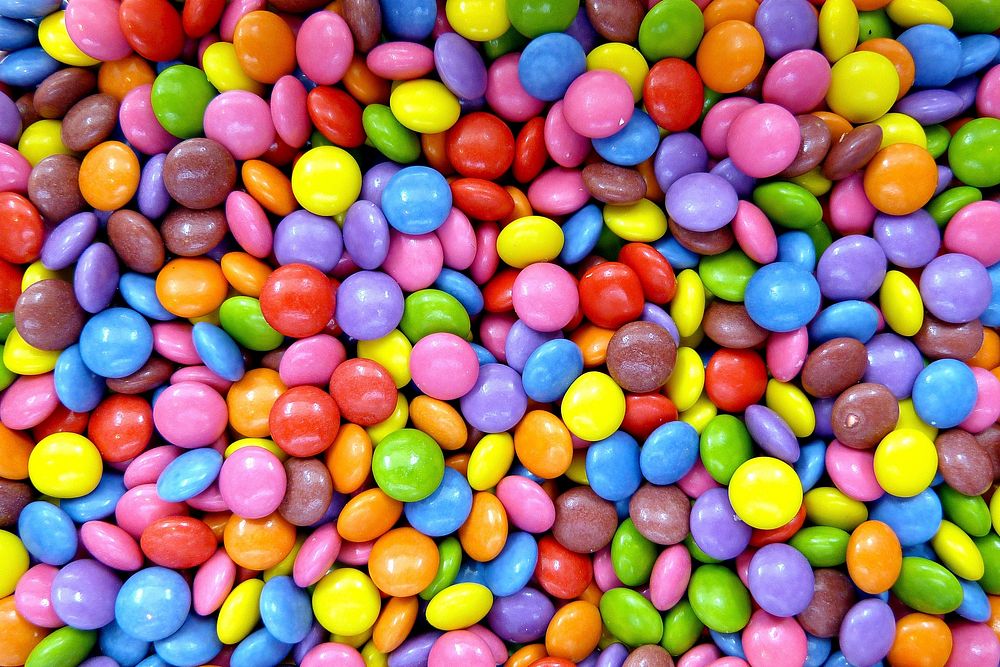 Free colorful candy background image, public domain CC0 photo.