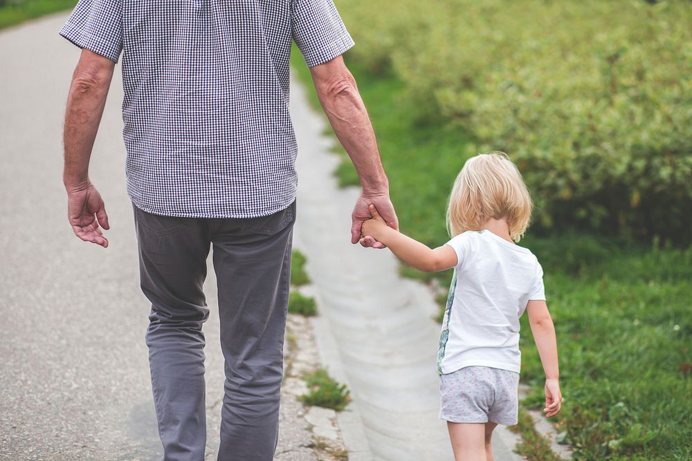 Free father holding child's hand image, public domain CC0.