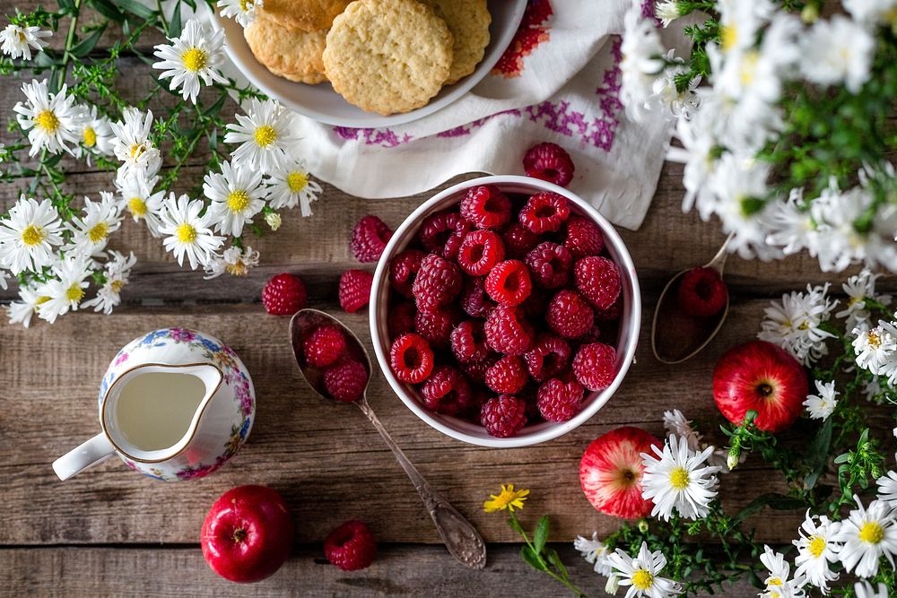 Free fresh raspberry in bowl with flower image, public domain food CC0 photo.