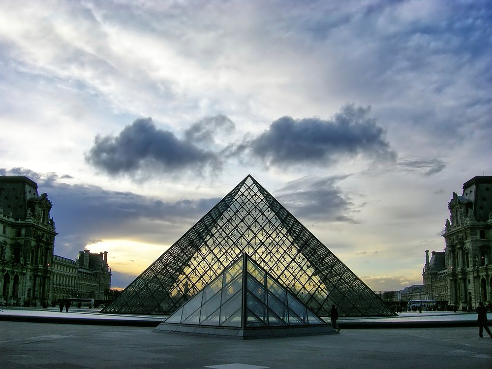 Free Louvre Pyramid during sunrise photo, public domain building CC0 image.