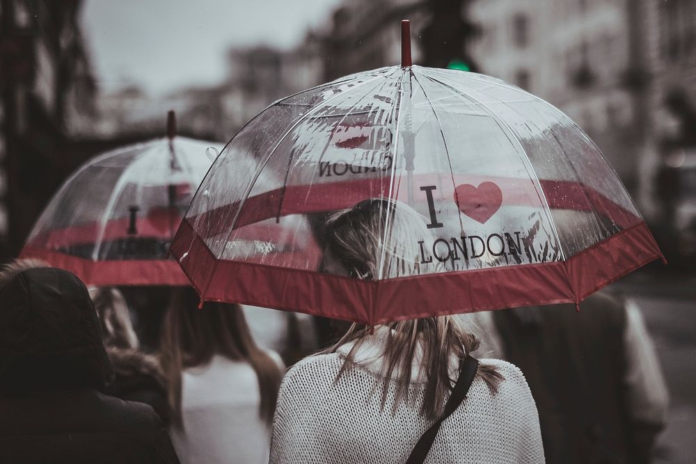 Free woman with umbrella image, public domain CC0 photo.