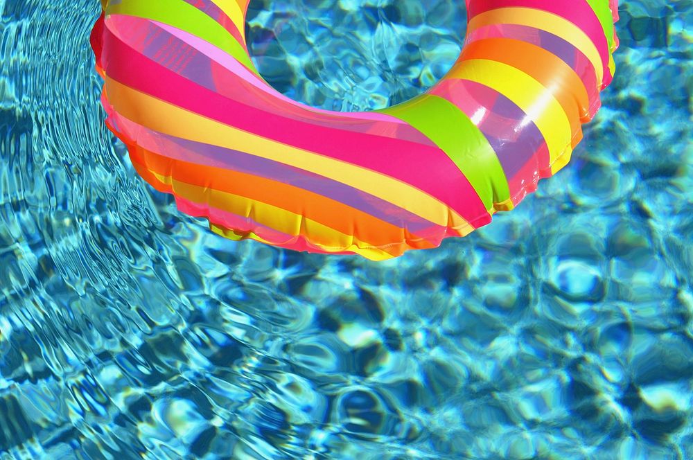 Free floating balloon in swimming pool image, public domain summer CC0 photo.