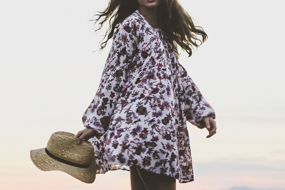 Free woman wearing floral dress image, public domain CC0 photo.